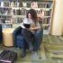 Senior Sara Najah gets some reading time in before class starts.