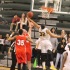 Senior Dominique Tham going up for the rebound.