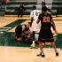 Both teams fight for the ball just before half time.