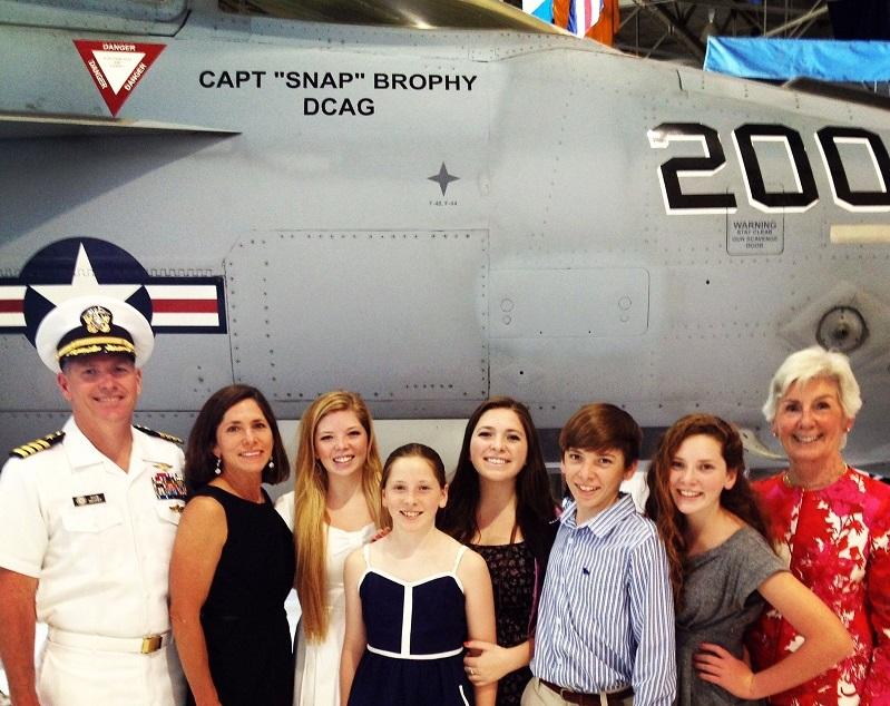 The+Brophy+Family+together+in+front+of+Captain+Brophys+jet.+