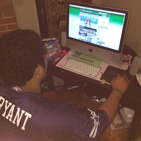 Anthony Tham '16 reviews his fantasy football team for the upcoming game. 