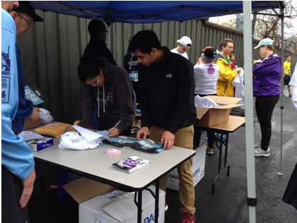 Seniors Adith Barua and Sofia Navas checked in participants on the day of the race.