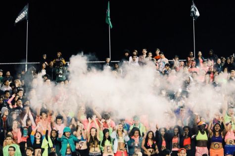 Superfans rattle the stands in excitement. 