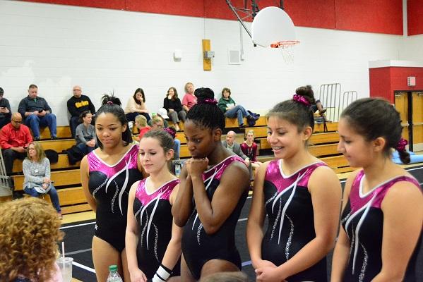 Wakefields gymnasts team talks to the judges before a meet. 