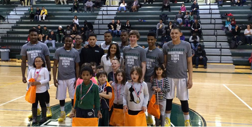 Students are celebrated at the final home VBB game for being part of the Leaders Are Readers program. 