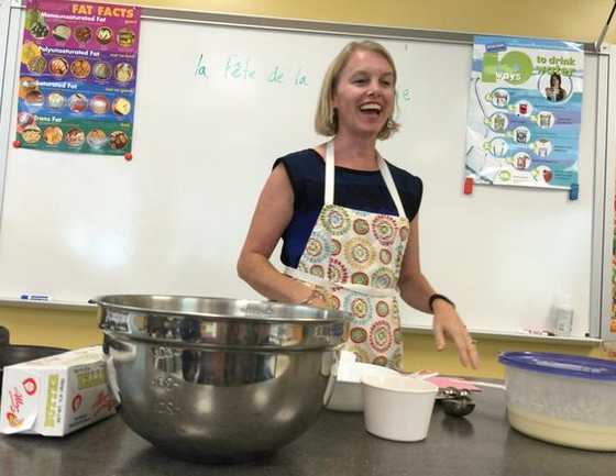 Ms. Haley talks about the perfect crepe batter with 4th period on Tuesday. 