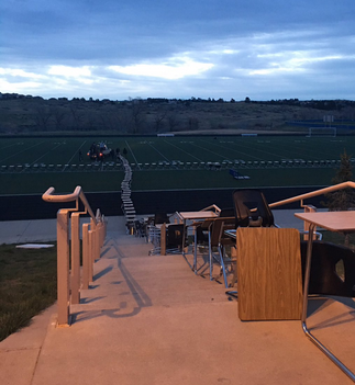 I guess that is one way to get out of classwork. Some seniors in Denver took all the desks out of the building and lined them up on the football field.