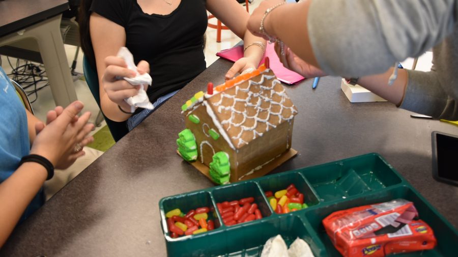 This Gingerbread house is in tip top shape! Built by Freshman Sophie Hott, Kimberley Rendon, Sophomore Qiao Huei and Junior Diana Alejandra Rivas Arenas