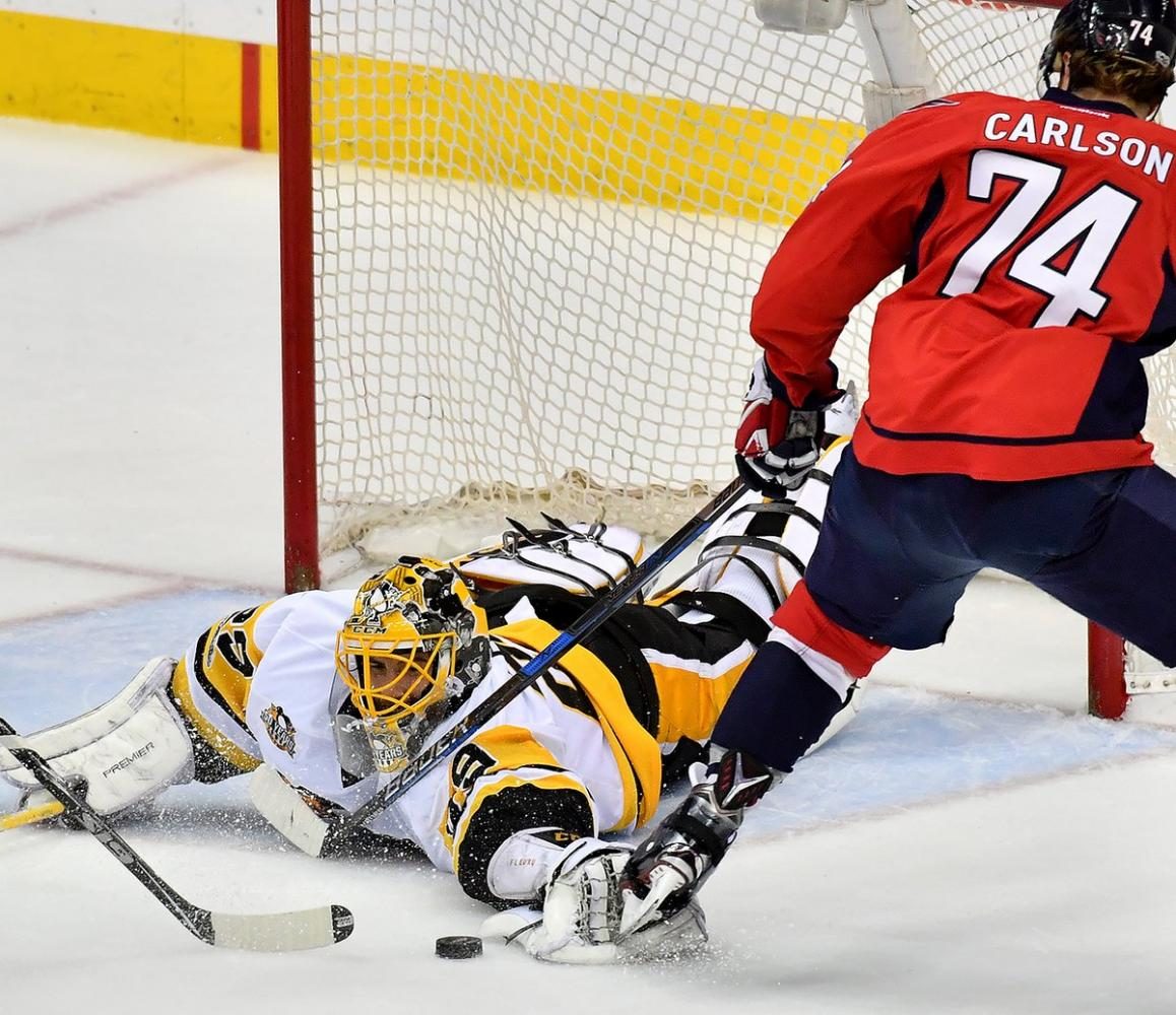 Penguins goaltender Marc-Andre Fleury makes another incredible save against the Capitals.