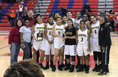 Here is the group shot after they won the Holiday tournament.