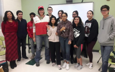 Here is Ms. Gaither, Ms. Labella and members of the club.  Ms. Labella is sharing memories from her trip to Puerto Rico in November.