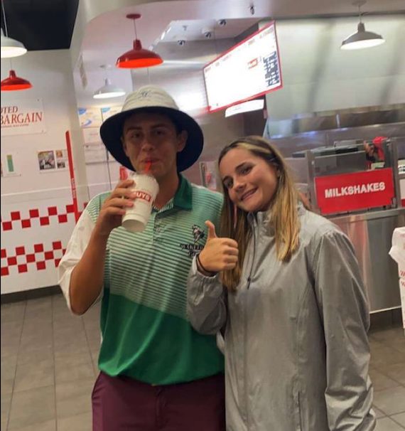 Esteban and Katelynn (from Madison High School) celebrating at Five Guys after the round.