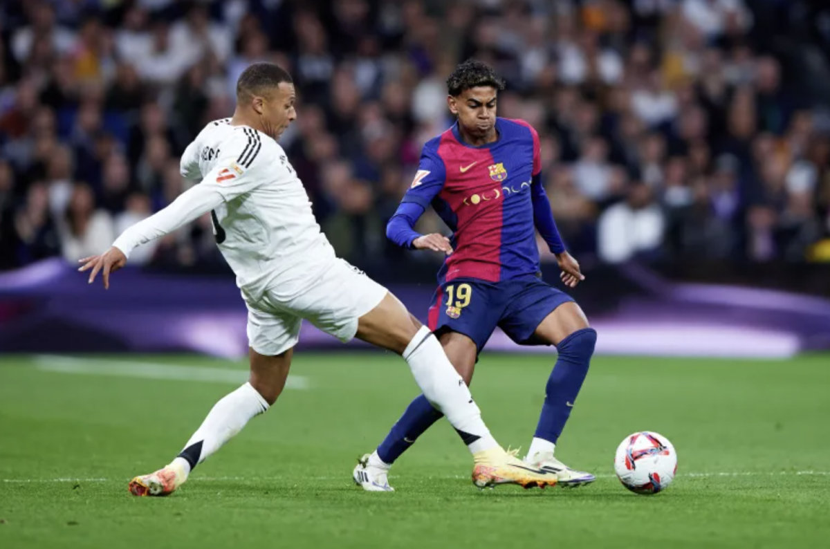 Barcelona's Lamine Yamal, right, and Kylian Mbappe of Real Madrid on the field. Photo found at www.aljazeera.com/sports